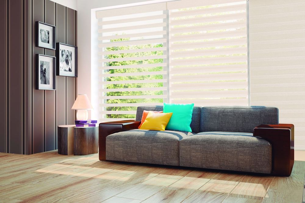 Cream PerfectSheer™ shade with open vanes on a large living room window