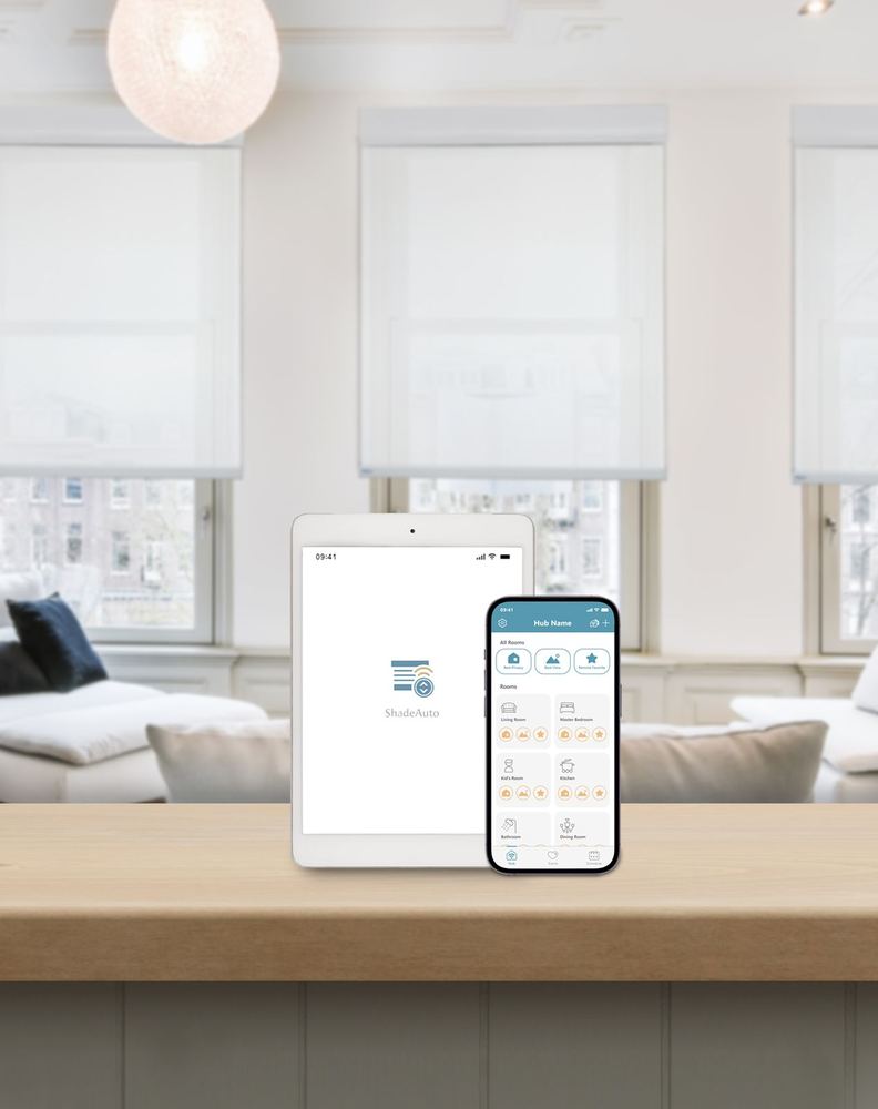 The ShadeAuto app open on a tablet and a phone, showing shades grouped by room